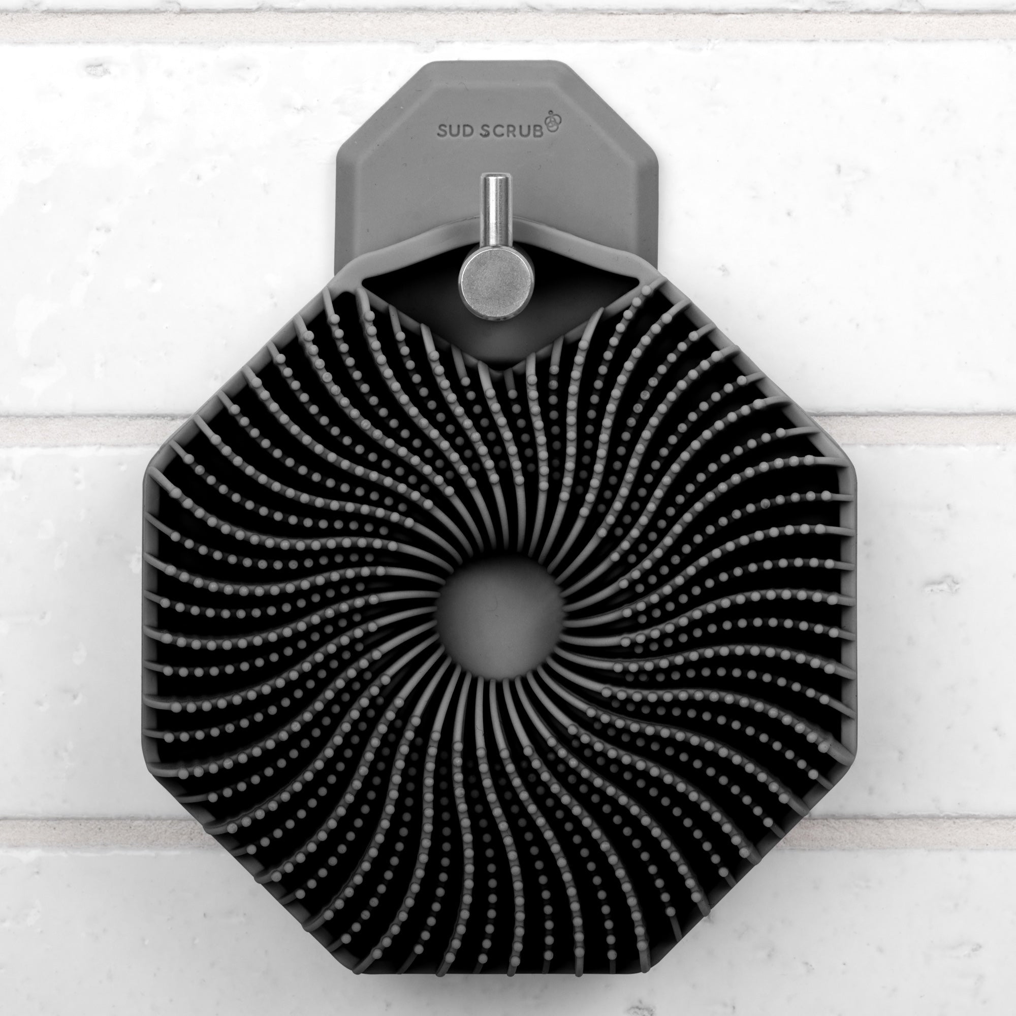 Sud Scrub Body Scrubber hanging on Sud Scrub Shower Hook