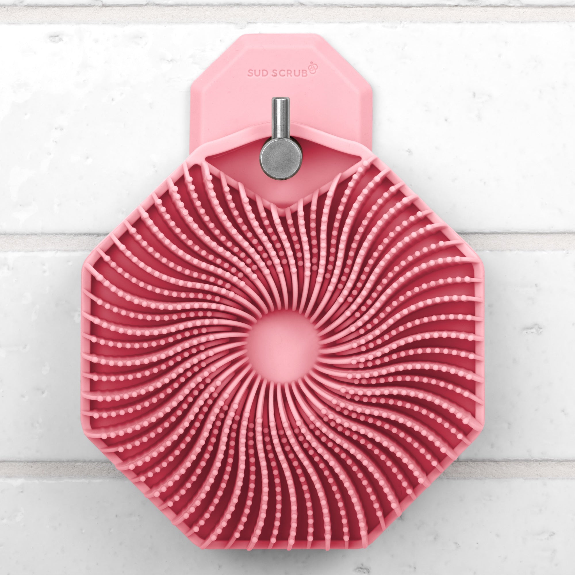 Sud Scrub Body Scrubber hanging on Sud Scrub Shower Hook